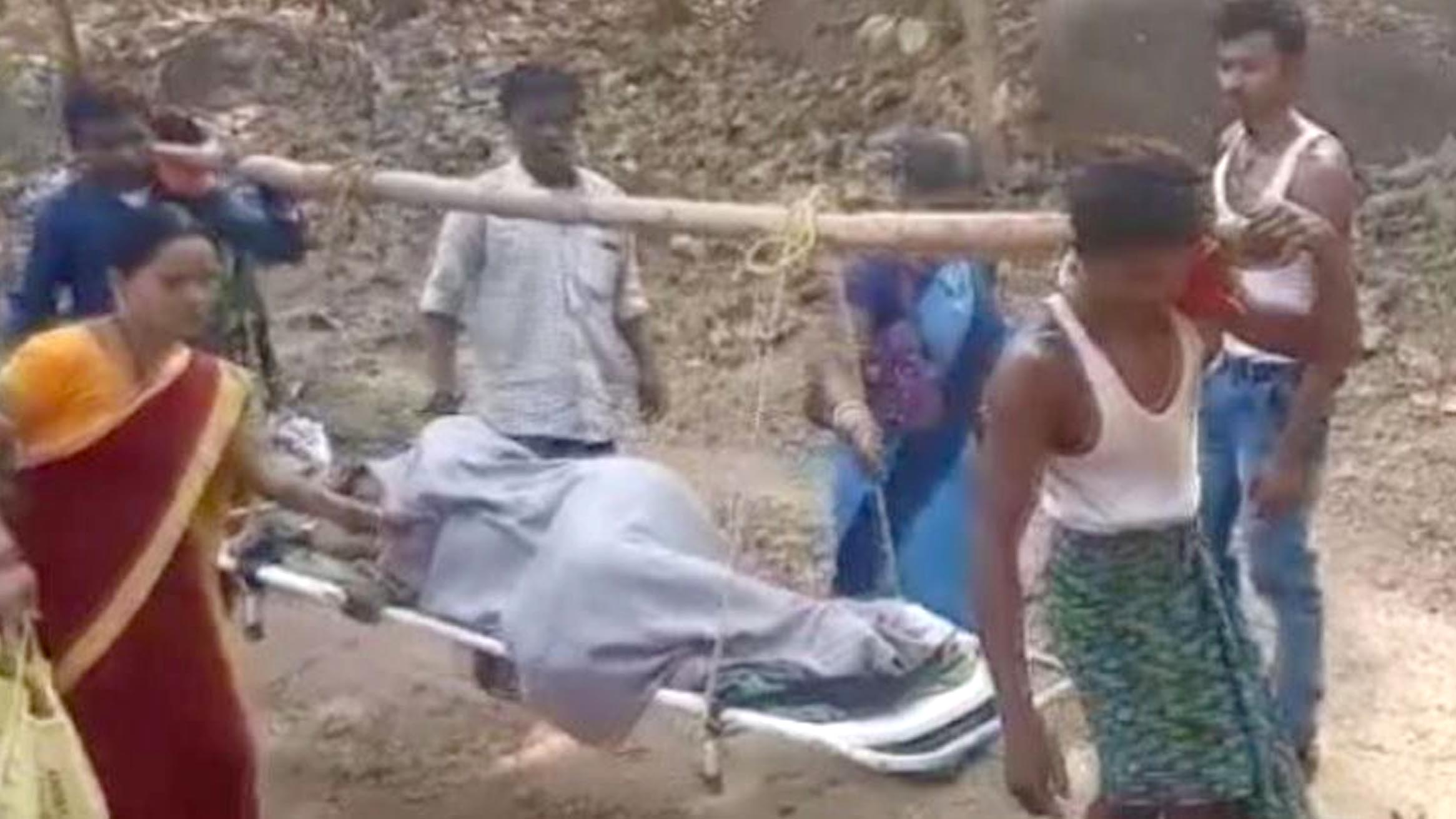 Pregnant woman carried on stretcher in Nuapada